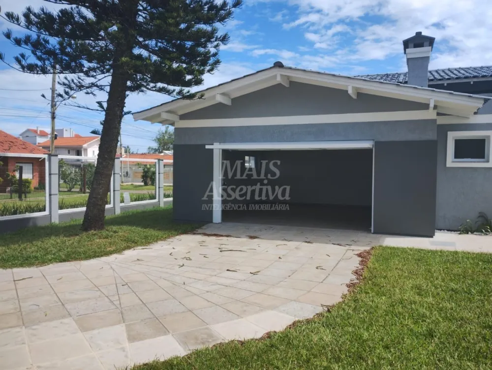 Excelente casa a venda em Tramandaí - 3 dormitórios, 2 vagas de garagem