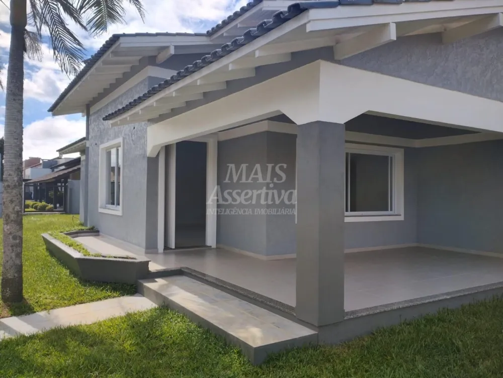 Excelente casa a venda em Tramandaí - 3 dormitórios, 2 vagas de garagem