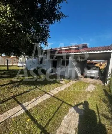 Ótima casa à venda em Tramandaí/RS - 3 dormitórios, piscina e 2 vagas